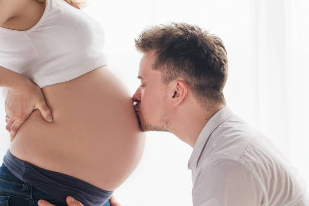 istock Husband and pregnant wife 1307401051