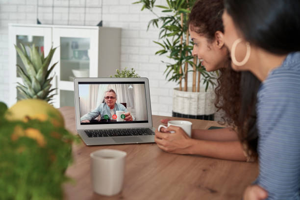 istock Two women during video call with father 1307401626