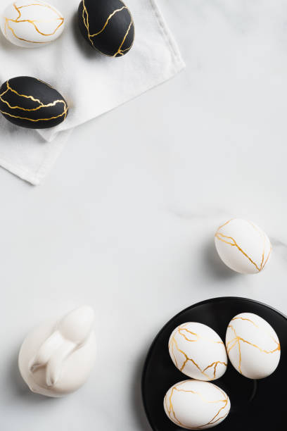 istock Happy Easter vertical banner design. Luxury Easter eggs, bunny on marble desk. Flat lay, top view, copy space. 1307402624