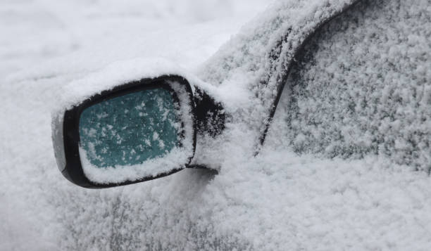 istock Snow covered car in winter. 1307404712