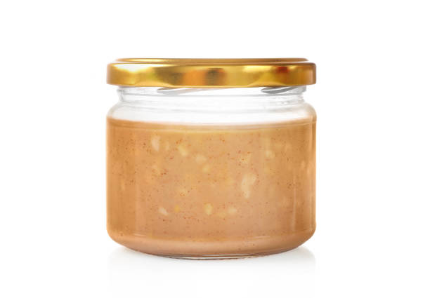 istock Glass jar full with peanut butter 1307406842