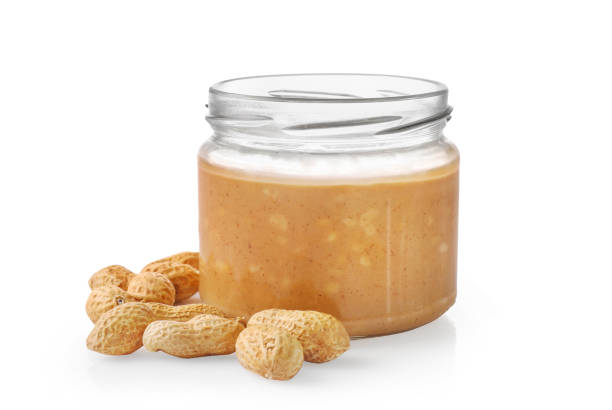 istock Glass jar full with peanut butter 1307406858