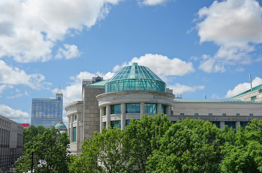 Raleigh North Carolina skyline with the NC Museum of Natural Sciences glass dome in the foreground.