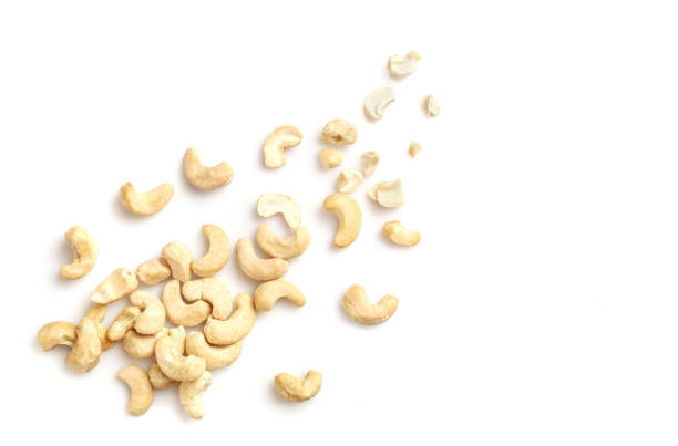 istock Tasty raw cashew nuts isolated on white 1307407697