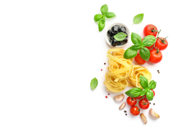 istock Food ingredients for italian pasta on white background. Top view. Copy space. 1307409624