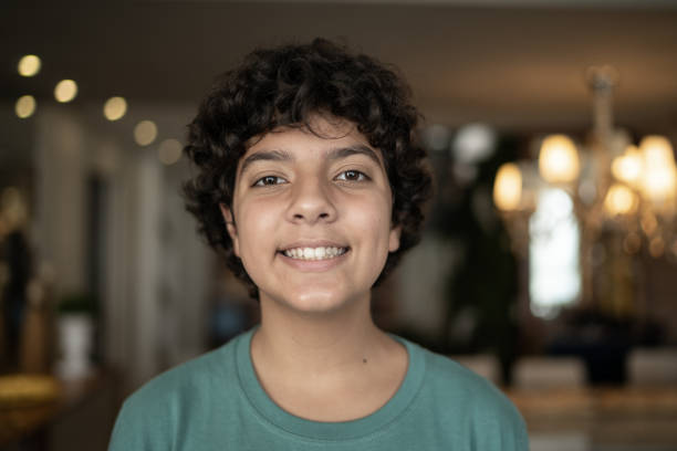 istock Portrait of a boy at home 1307412099