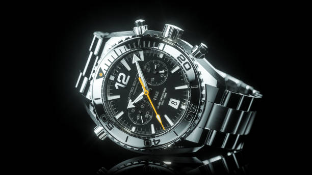 istock Mechanical stainless steel wristwatch isolated on black background 3d 1307412385