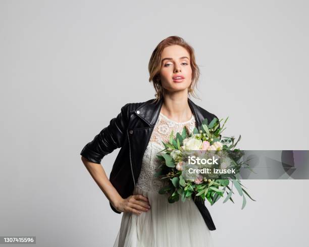 Bride Wearing Weeding Dress And Leather Jacket Stock Photo - Download Image Now - Leather Jacket, Bride, Fashion Model