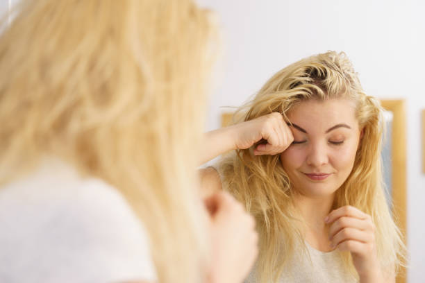 istock Woman feeling tired in bathroom 1307416670