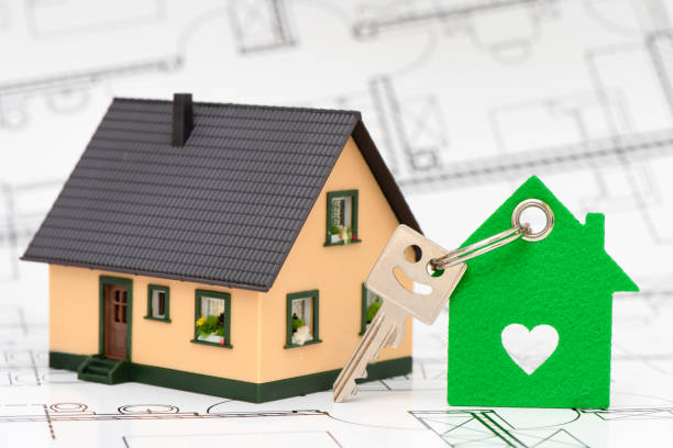 istock model home and house key 1307417940