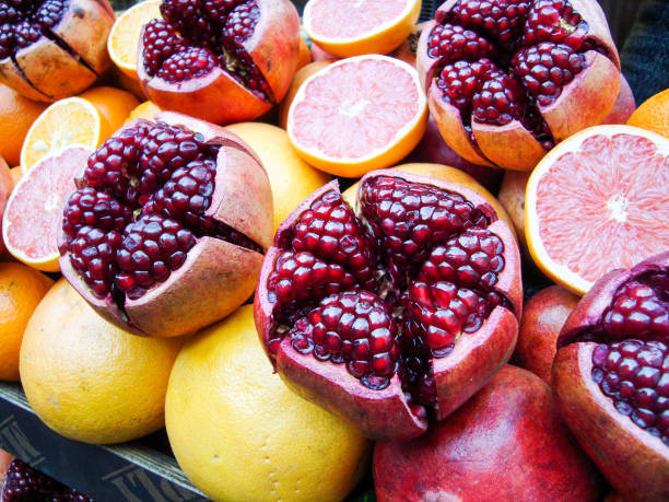istock ripe pomegranate fruits on a wooden table 1307419681