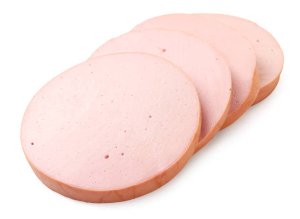 istock Boiled sausage cut into pieces on a white background. Isolated 1307425004