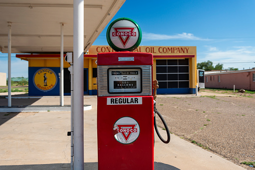 Tucumcari, New Mexico - July 9, 2014: An old Conoco gas pump at a service station along the historic us route 66 in in the city of Tucumcari, New Mexico.