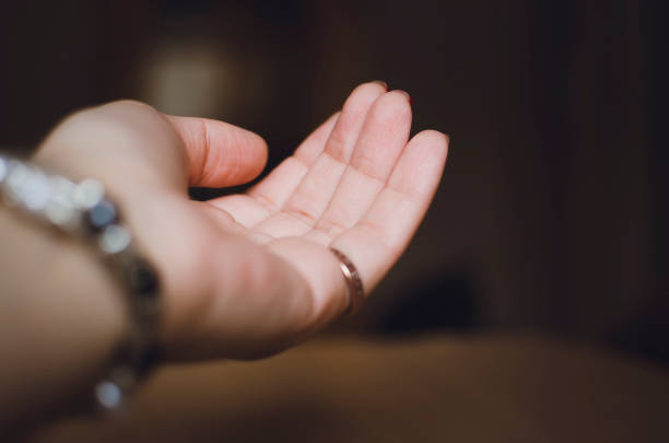 istock Human palm, close-up. The concept of request, help. 1307429710