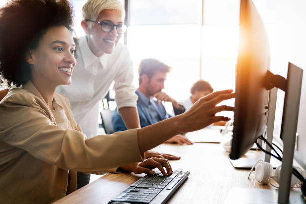 istock Startup business people group of programmer working as team to find solution to problem 1307433810