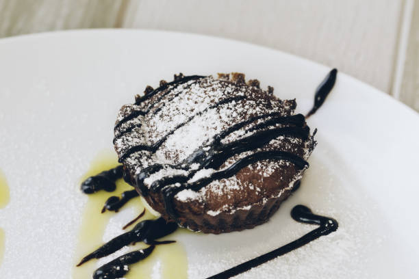 istock hot chocolate pudding, fondant with hot chocolate 1307434624