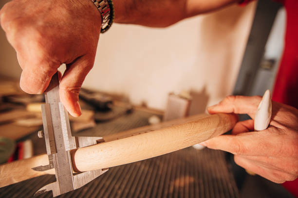 istock Measuring wood thickness with calipers 1307435341