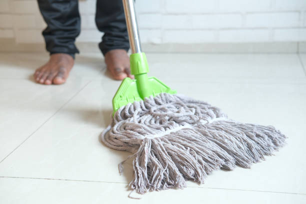 istock cleaning tiles floor with mop 1307436629