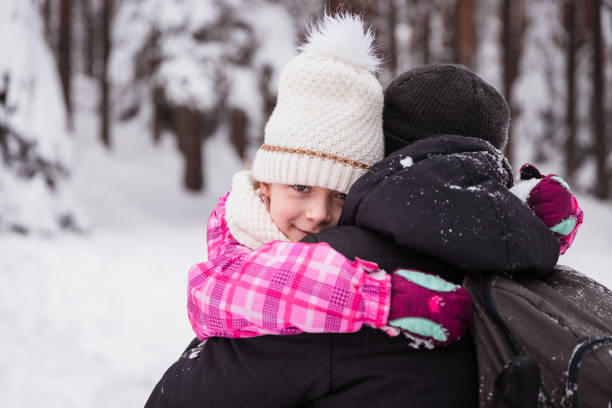 istock Girl hugging her dad 1307437029
