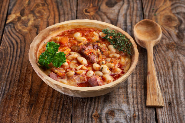 istock Smoked pork and beans stew on a rustic table 1307438114