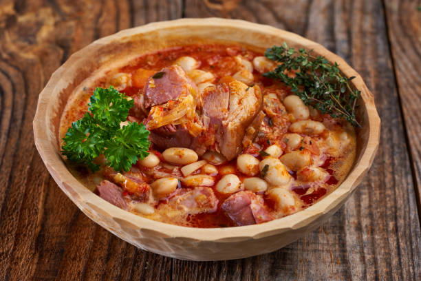 istock Smoked pork and beans stew on a rustic table 1307438116
