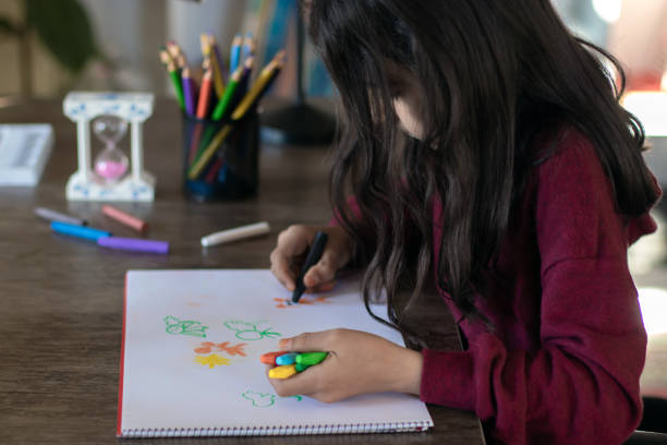 istock The child painting with colored paints 1307440515