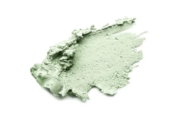 Smear of cosmetic clay isolated on a white background.