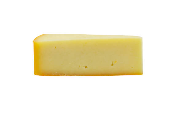 istock Piece of cheese isolated on white background 1307442716