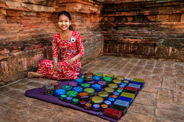 istock Young Burmese girl selling a lacquerware in Bagan, Myanmar 1307451115