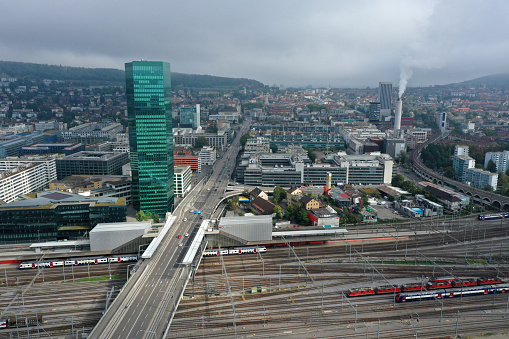 Zürich with the Hardbrücke and the large track fieds fro the Swiss Federal Railway company. The high ange image was captured during autumn season.