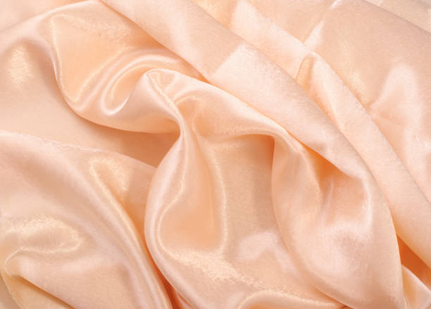 istock Beige satin glitter luxury fabric background with copy space, Backgrounds; Textured; Textile; Silk 1307455153
