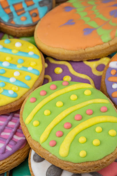 istock Easter decorated baked eggs, cookies as background. 1307455435