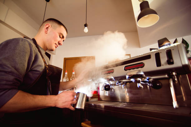 istock Barista hands making coffee cup with coffee machine in coffee shop 1307457722