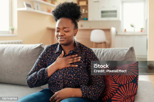 This Does Not Feel Normal Stock Photo - Download Image Now - Women, Heartburn, One Woman Only