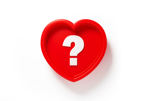 Red heart shape with question mark sitting on white background.  Horizontal composition with copy space. Q and A concept.