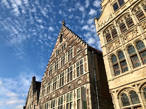 Ghent, Belgium - May 26, 2019: Classic buildings in Ghent City Center (old town)