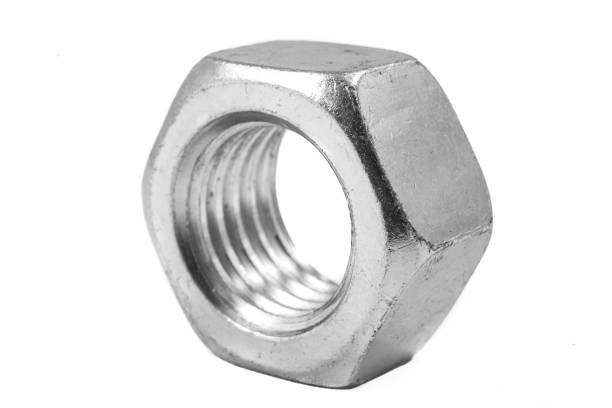 istock Metal nut with metric thread. Metal accessories for assembling metal parts. Light background. 1307467941
