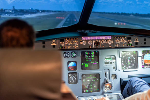istock pilots in a cockpit in an airplane 1307468746