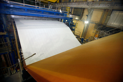 machines for the production of paper rolls for further processing in a printing plant