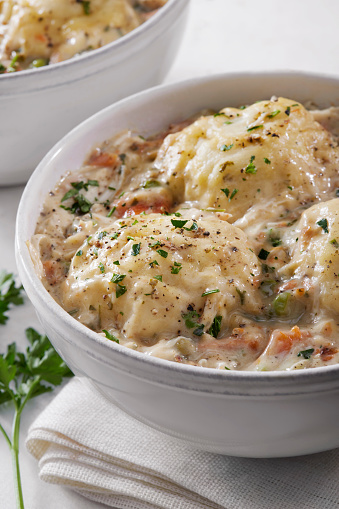 Creamy Chicken and Dumplings with Roast Chicken, Green Peas, Celery and Carrots