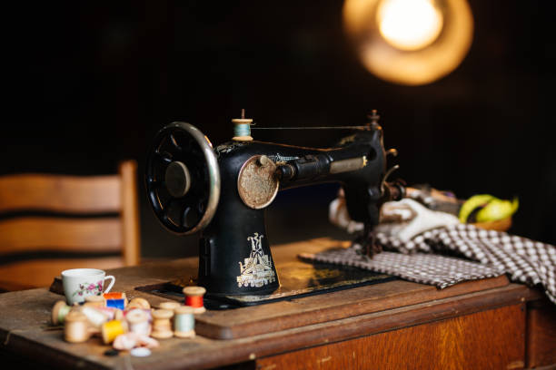 istock Nostalgic Sewing Machine with Fabric and Design Equipments 1307471254