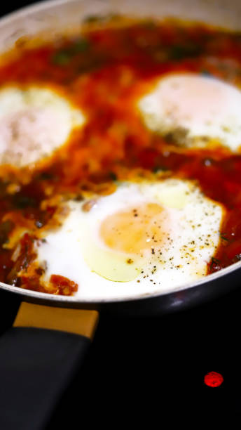 istock Shakshuka cooked on a frying pan. 1307472467