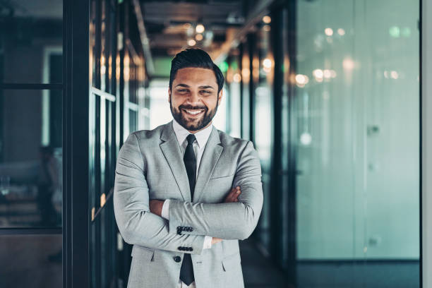 istock Businessman with arms crossed 1307477216