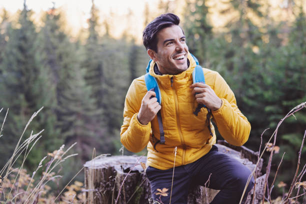 istock Happy hiker high in the mountain 1307477232
