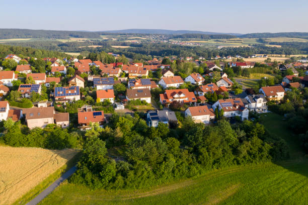 istock Houses in Summer Landscape 1307483468