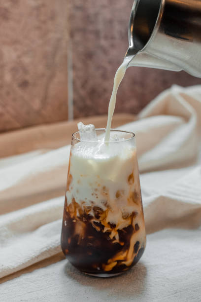 istock Glass of coffee on the table 1307500624