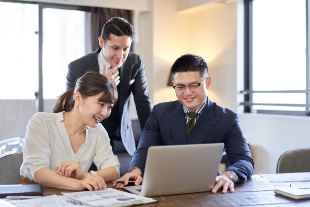 istock Asian and Latin business people having web conferencing on a computer 1307502334