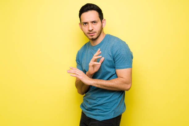 istock Fearful man in his 30s looking scared and nervous 1307503676