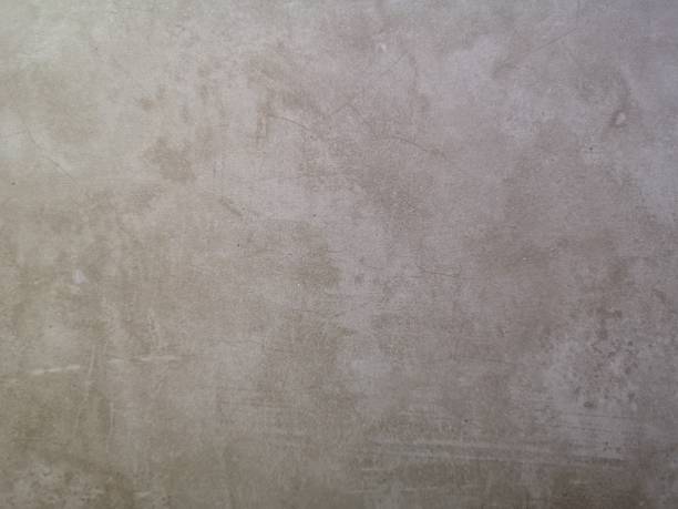 istock crack on cement wall bare polished brown color and smooth surface texture concrete material vintage background detail architect construction brick walls plastered and painted 1307504258