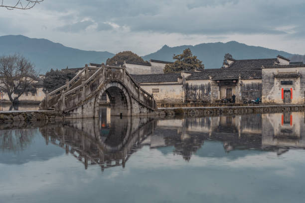 istock Hongcun village on a rainy day 1307505334
